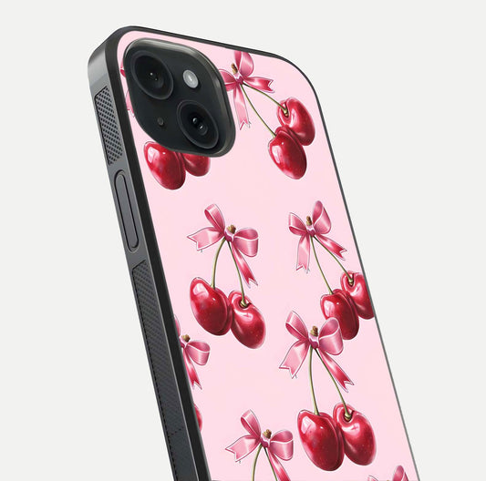 Red Cherries Pattern Glass Case for iPhone 15 close-up angled shot showing cherry details and HD reflection