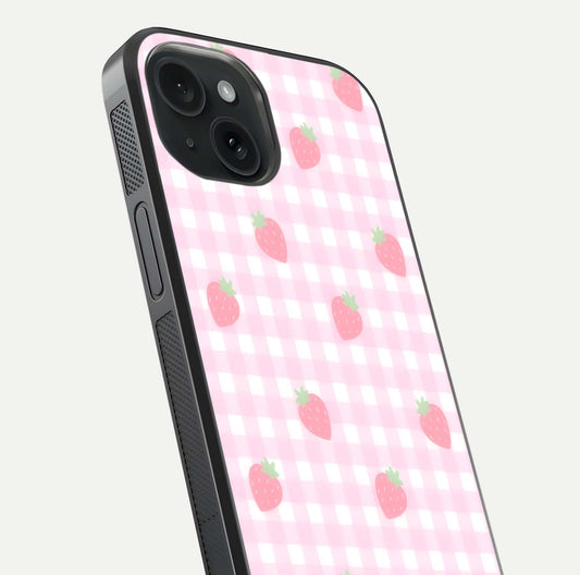 Strawberry Picnic Love iPhone 15  glass phone case angled back view highlighting strawberry illustrations and textured grip