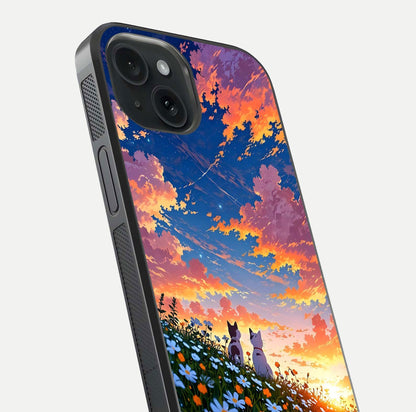 Two Cats Friends Glass Case for iPhone 15 close-up angled shot highlighting cat illustrations and soft reflection