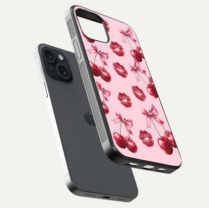 Cherry With Lips Glass Case for iPhone 15 floating mockup showing HD gloss and pop-art inspired tones