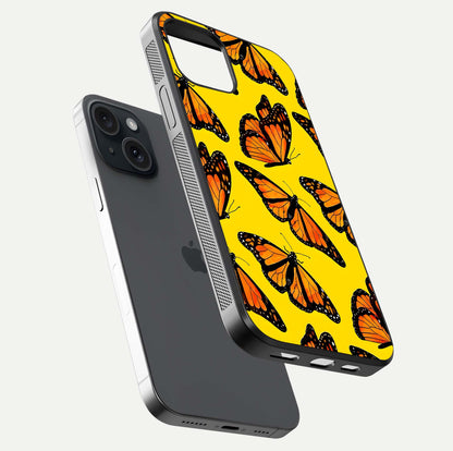 Golden Wing Flight Glass Case for iPhone 15 floating dual-view mockup showing gloss reflection and luxury tone