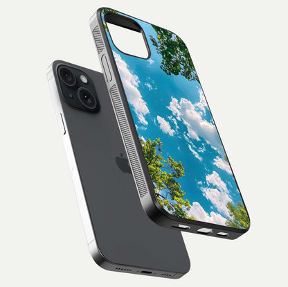 Greenery Sky Glass Case for iPhone 15 floating dual-view mockup showing glossy shine and soft natural tones