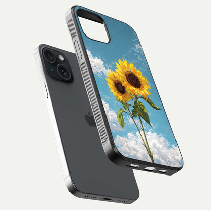 Sunflower Sky Bloom Glass Case for iPhone 15 floating dual-view mockup displaying gloss shine and vibrant texture