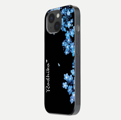 Blue Petal Dream Custom Name Glass Case for iPhone 15 side-angle image showing name print clarity and smooth gloss