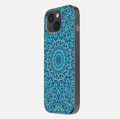 Ocean Bloom Mandala Glass Case for iPhone 15 side-angle image showing reflection and detailed floral pattern