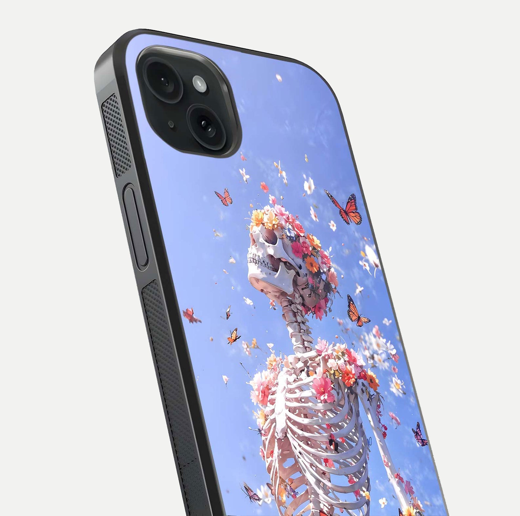 Bloom Beyond Bones Glass Case for iPhone 15 Plus close-up highlighting unique bone-floral fusion art and reflection