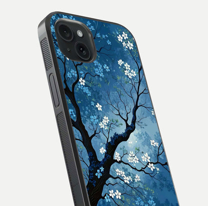 Blue Tree Serenity Glass Case for iPhone 15 Plus close-up view highlighting tree branches and reflection gloss