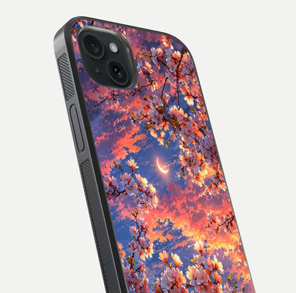 Celestial Sakura Sunset Glass Case for iPhone 15 Plus close-up image highlighting blossom petals and gloss shine