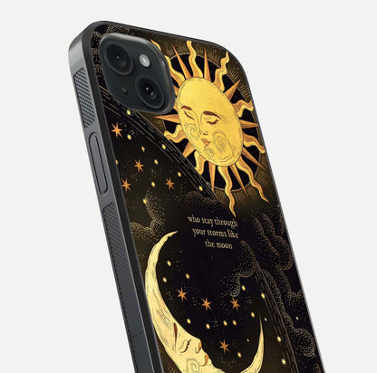 Golden Lunar Love Glass Case for iPhone 15 Plus close-up angled shot showing moon glow, texture, and reflection polish