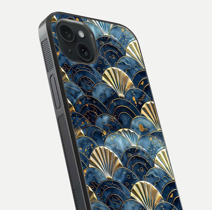 Golden Wave Luxe Glass Case for iPhone 15 Plus close-up angled shot showing flowing wave texture and reflection brightness