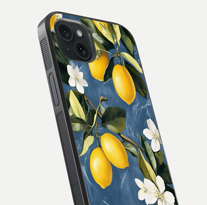 Lemon Dream Garden Glass Case for iPhone 15 Plus close-up angled shot showing fruit details and shine reflection