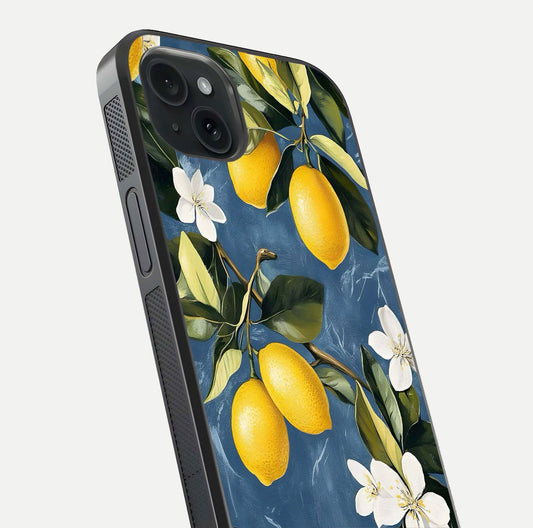 Lemon Dream Garden Glass Case for iPhone 15 Plus close-up angled shot showing fruit details and shine reflection
