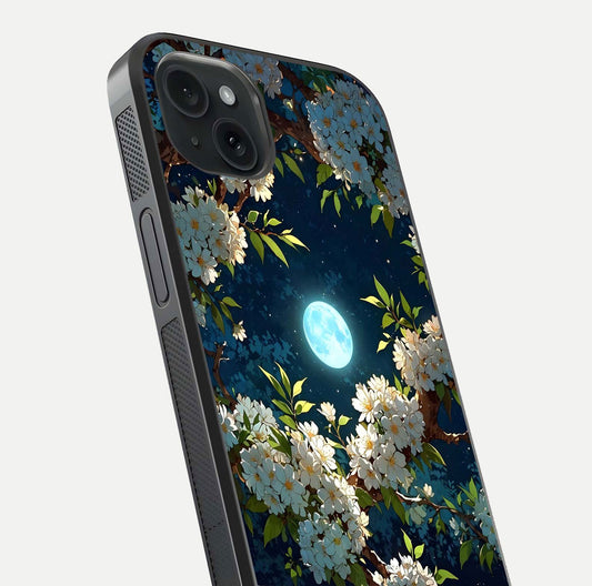 Moonlit Blossom Dream Glass Case for iPhone 15 Plus close-up angled shot showing glowing petals and reflection