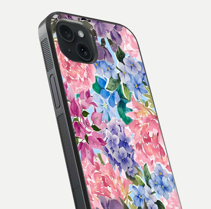 Pastel Floral Mix Glass Case for iPhone 15 Plus close-up angled shot highlighting flower detail and reflection