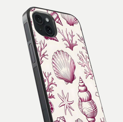 Pink Shells Outline Glass Case for iPhone 15 Plus close-up angled shot showing fine shell lines and reflection