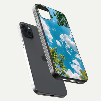 Greenery Sky Glass Case for iPhone 15 Plus floating dual-view mockup showing glossy shine and soft natural tones