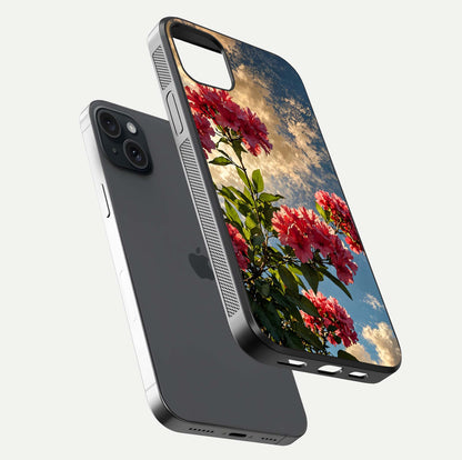 Red Bloom Skies Glass Case for iPhone 15 Plus floating dual-view mockup showing glass gloss and floral pattern