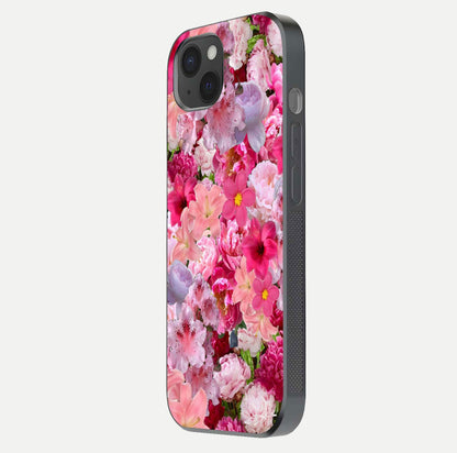 Bloom Crush Fantasy Glass Case for iPhone 15 Plus side-angle shot with fantasy bloom art and gloss surface