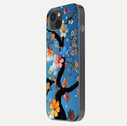 Blossom Dream Sky Glass Case for iPhone 15 Plus side-angle photo showing flower details, edge curve, and reflection shine