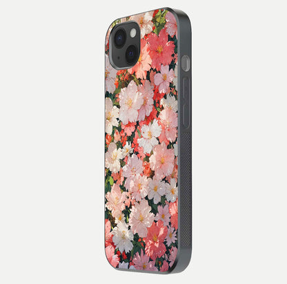 Blush Bloom Field Glass Case for iPhone 15 Plus side-angle image showing petal pattern gloss and smooth edges
