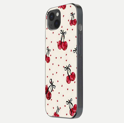 Cherry Heart Bow Glass Case for iPhone 15 Plus side-angle image capturing gloss texture and charm bow art