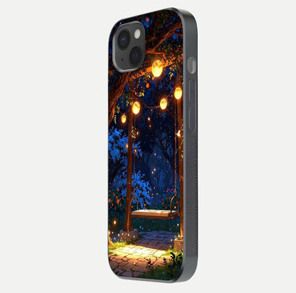 Twilight Garden Swing Glass Case for iPhone 15 Plus side-angle image showing reflection, gloss, and scenic depth