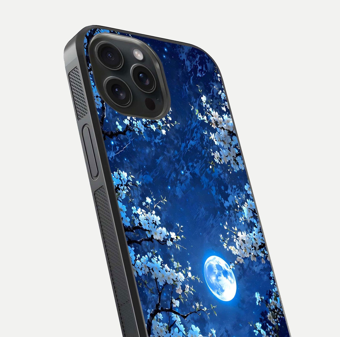 Blossom Moonlight Sky Glass Case for iPhone 15 Pro close-up angle capturing moon glow and flower detail reflections