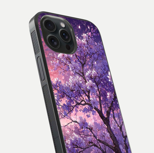 Blossom Tree Glass Case for iPhone 15 Pro close-up image highlighting tree branches, blossoms, and shine