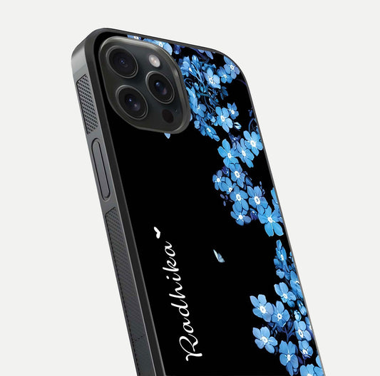 Blue Petal Dream Custom Name Glass Case for iPhone 15 Pro close-up highlighting petal texture and gloss reflection
