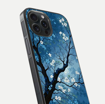 Blue Tree Serenity Glass Case for iPhone 15 Pro close-up view highlighting tree branches and reflection gloss