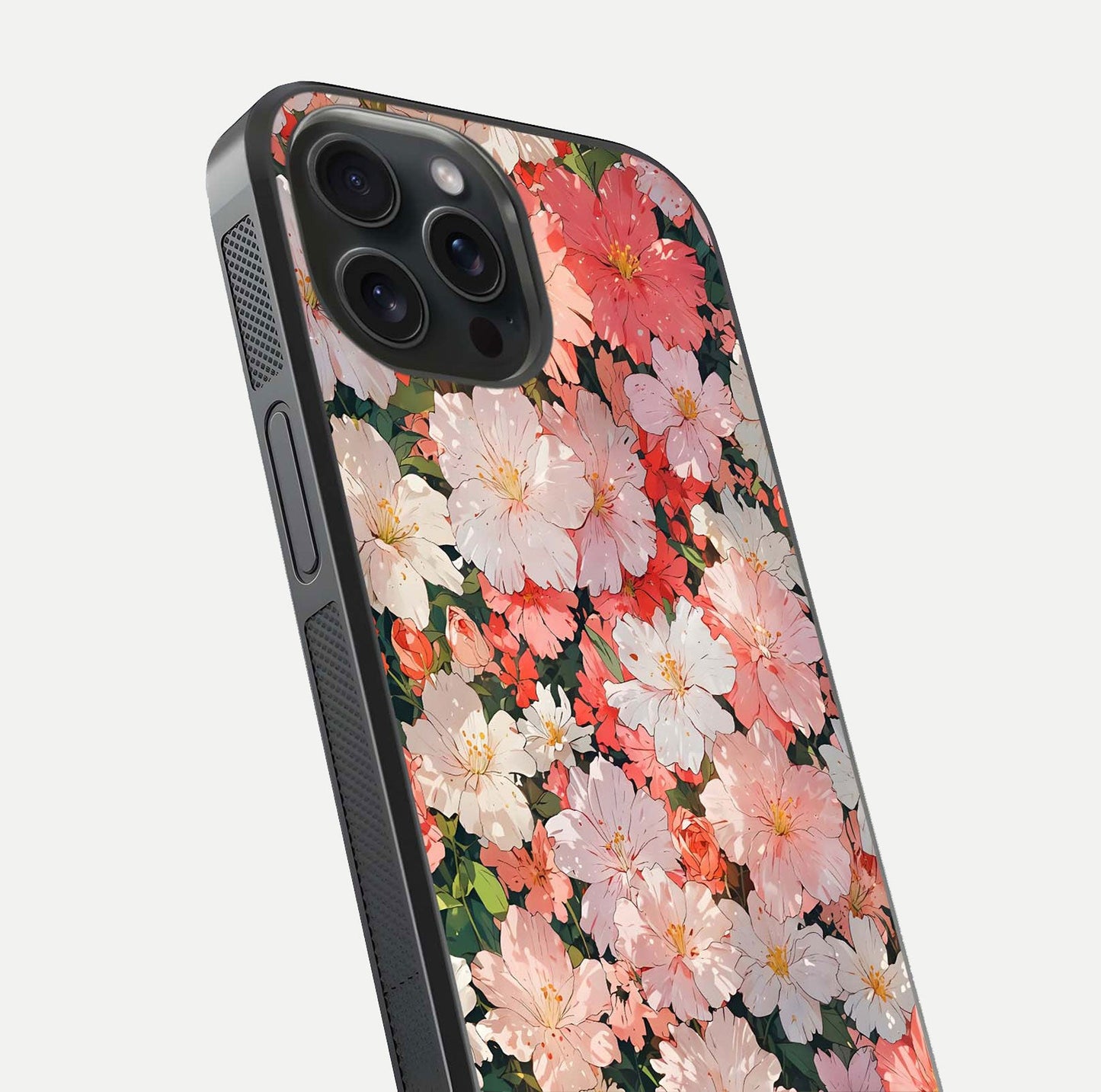 Blush Bloom Field Glass Case for iPhone 15 Pro close-up shot capturing pastel flower field tones and gloss shine