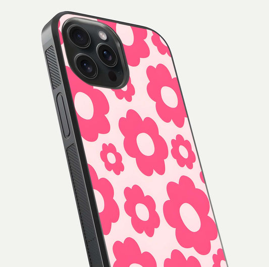 Blush Flower Pop iPhone 15 Pro glass phone case angled back view highlighting bright floral pop design and side grip texture
