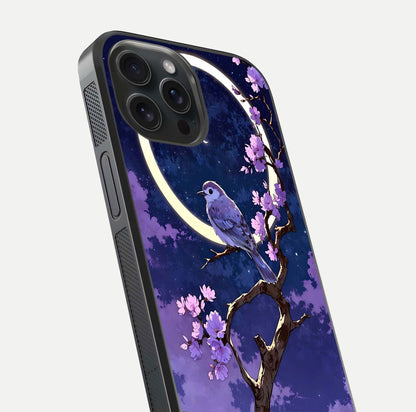 Celestial Bird Blossom Glass Case for iPhone 15 Pro close-up capturing bird detail, petal reflection, and gloss shine