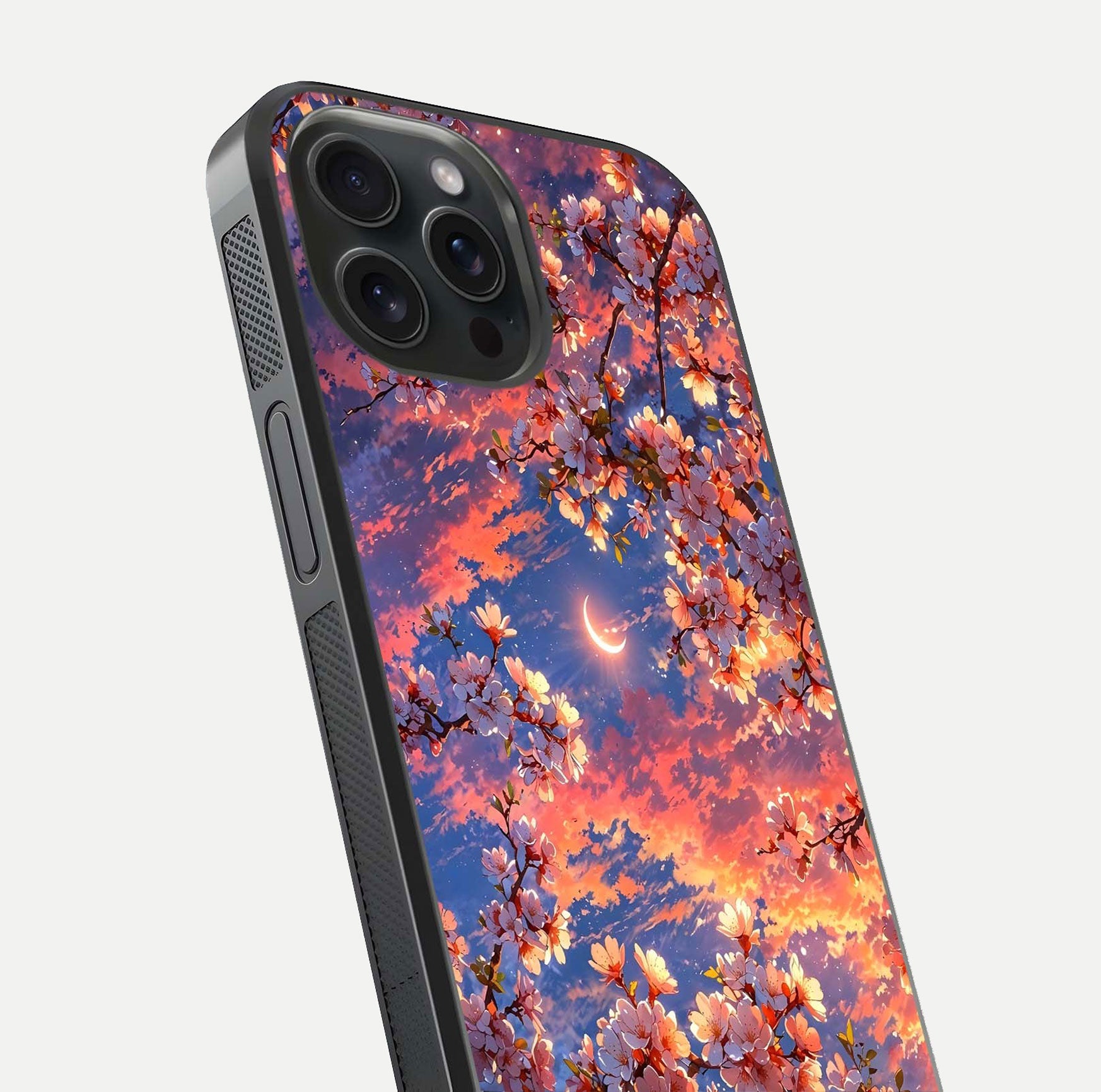 Celestial Sakura Sunset Glass Case for iPhone 15 Pro close-up image highlighting blossom petals and gloss shine