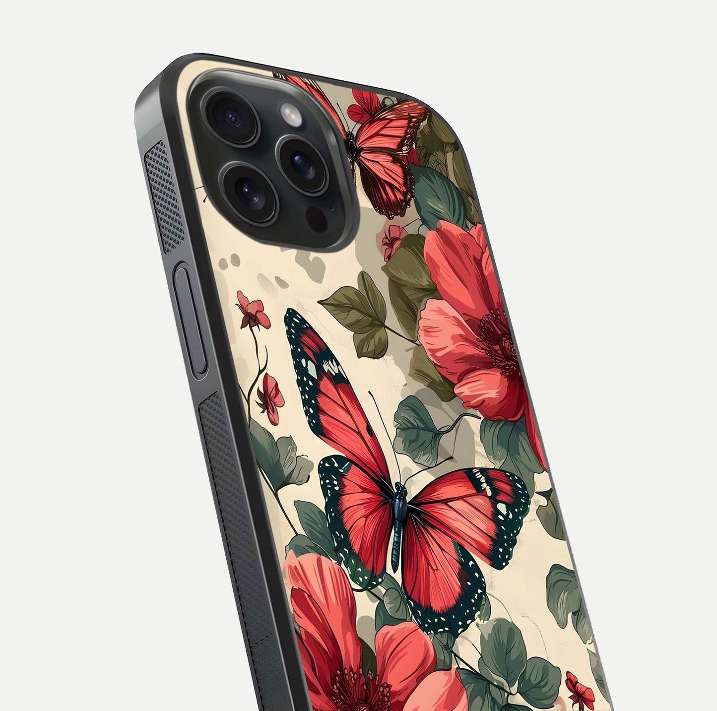 Crimson Butterfly Garden Glass Case for iPhone 15 Pro close-up showing wing detail and reflection shine