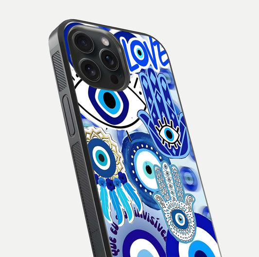 Evil Eyes Dream Glass Case for iPhone 15 Pro close-up highlighting evil-eye charm detail and light reflection on glass