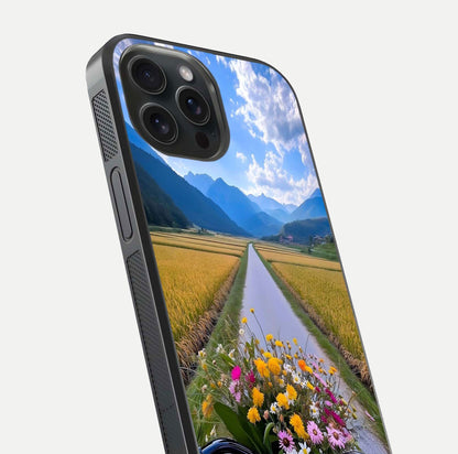 Golden Field Journey Glass Case for iPhone 15 Pro close-up angled shot showing sunlight tones and reflection clarity