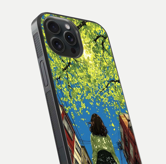 Golden Leaves Glow Glass Case for iPhone 15 Pro close-up angled shot showing fine leaf texture and reflection shine