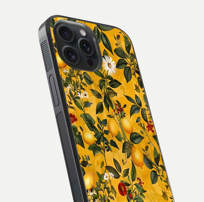 Golden Lemon Field Glass Case for iPhone 15 Pro close-up angled shot showing citrus texture and reflection brilliance