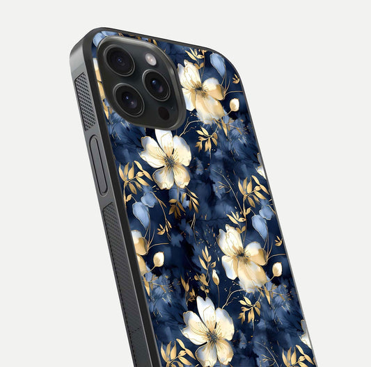 Golden Midnight Bloom Glass Case for iPhone 15 Pro close-up angled shot showing floral detail and reflection shine
