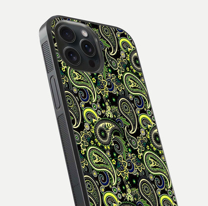 Green Mandala Pattern Glass Case for iPhone 15 Pro close-up angled shot showing fine detailing and gold-green reflection