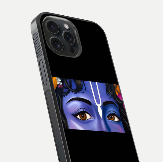 Krishna Eye Glass Case for iPhone 15 Pro close-up angled shot showing intricate artwork and reflection shine
