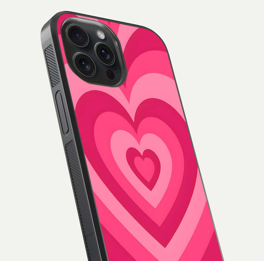 Layered Love Hearts iPhone 15 Pro glass phone case angled back view highlighting heart artwork and textured grip edges