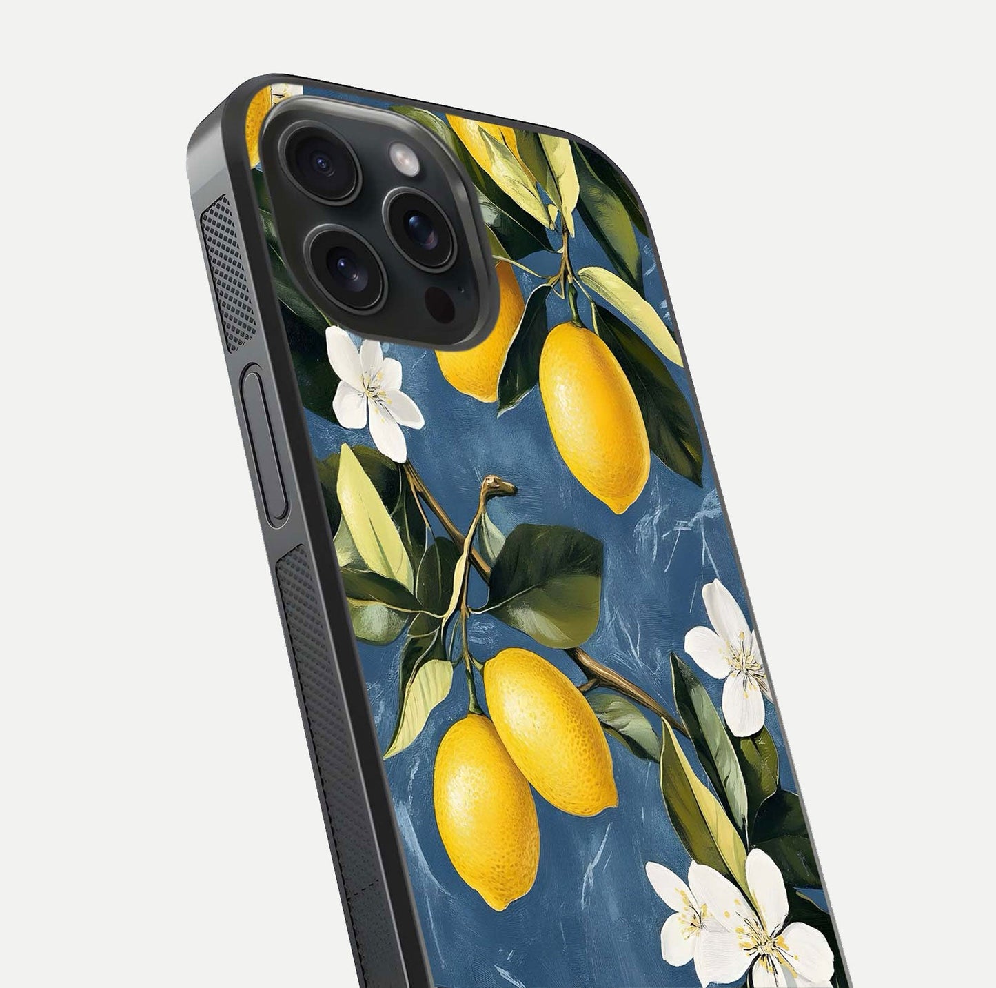 Lemon Dream Garden Glass Case for iPhone 15 Pro close-up angled shot showing fruit details and shine reflection