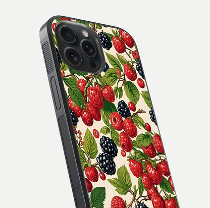 Mixed Berry Collage Glass Case for iPhone 15 Pro close-up angled shot showing fruit detail and reflection glow