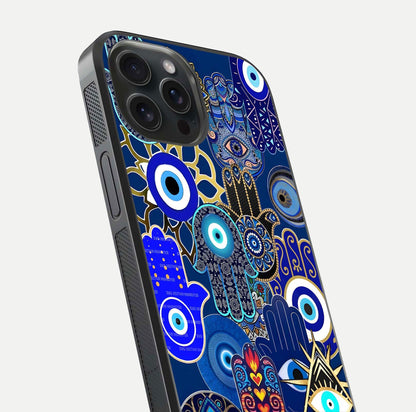 Mystic Palm Guard Glass Case for iPhone 15 Pro close-up angled shot showing eye symbol and fine texture