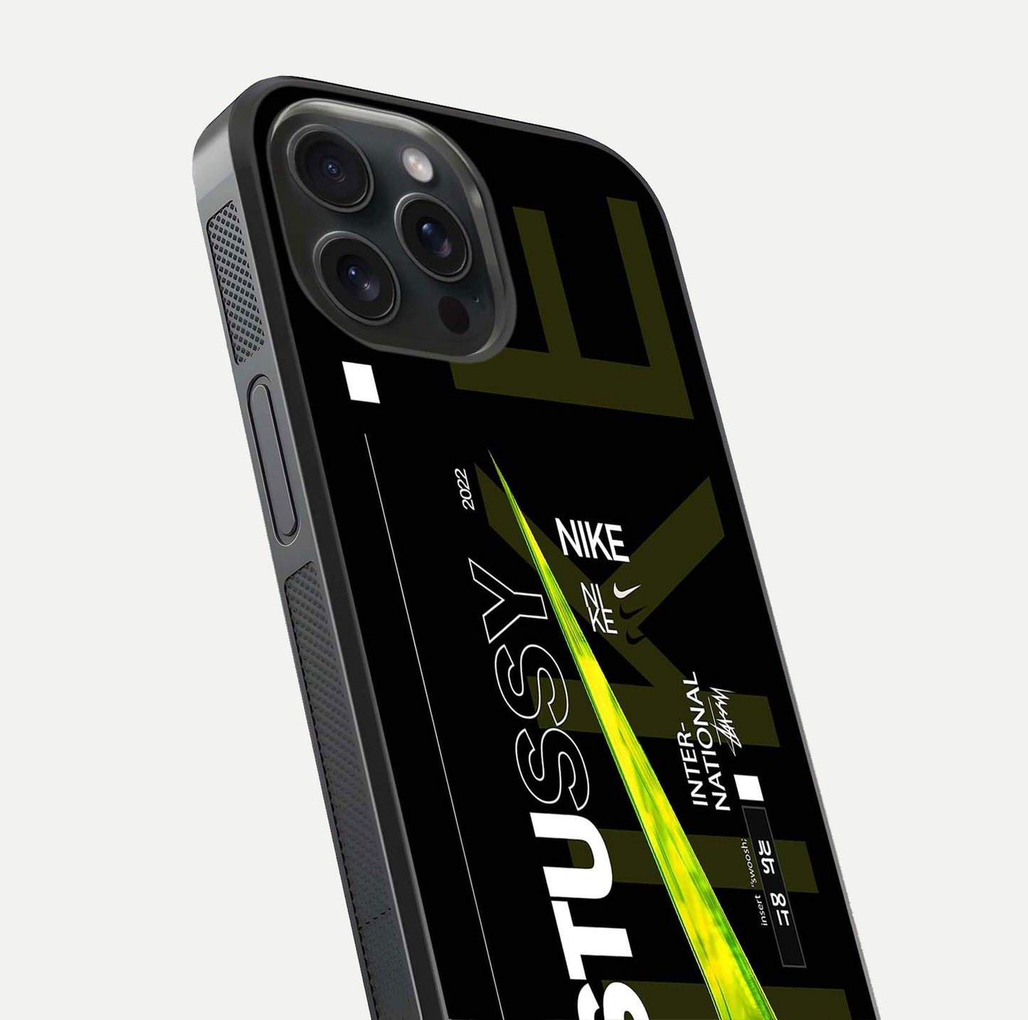 Neon Street Edition Glass Case for iPhone 15 Pro close-up angled shot showing urban neon lights and shine