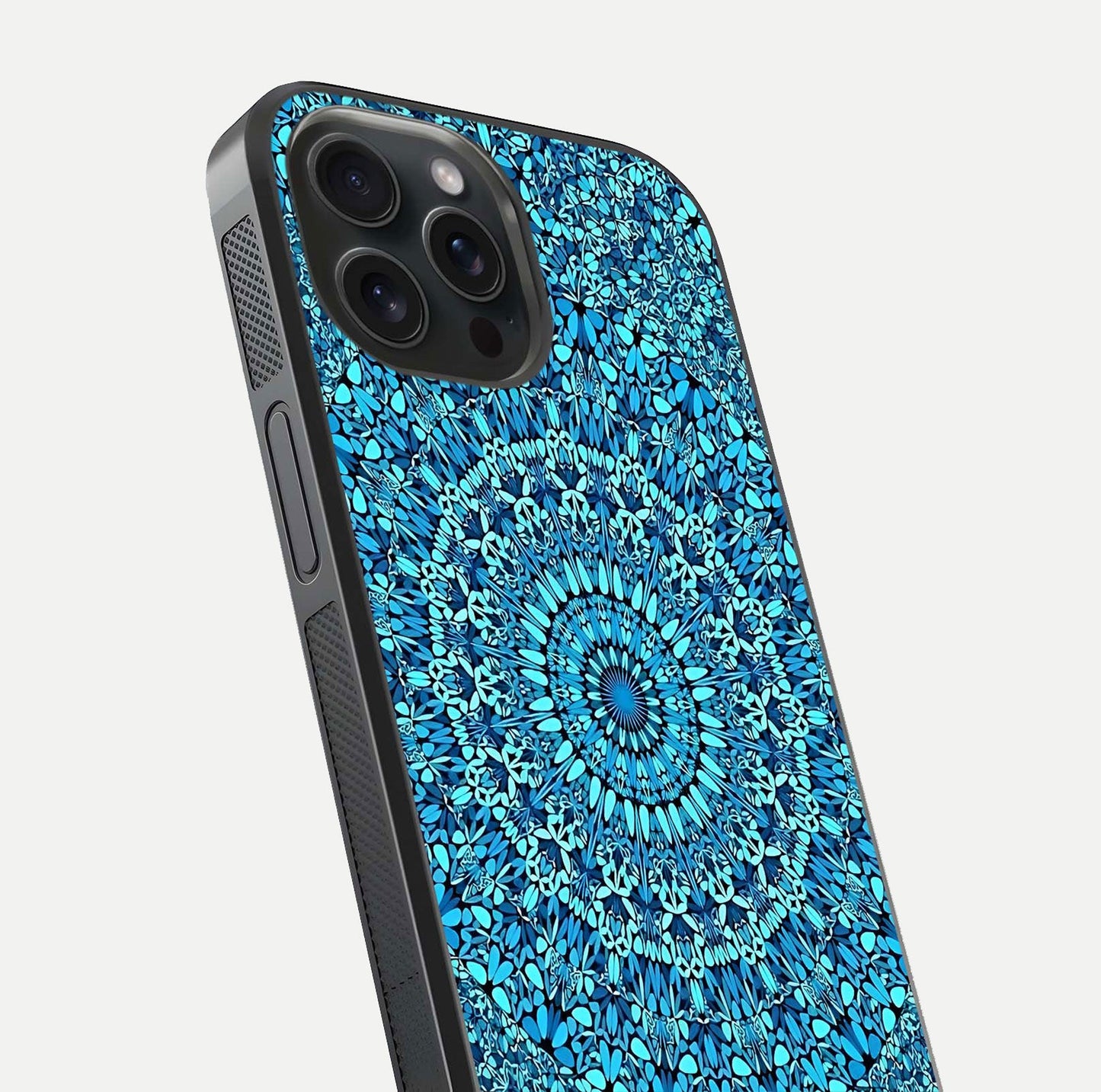 Ocean Bloom Mandala Glass Case for iPhone 15 Pro close-up angled shot highlighting detailed mandala and reflection
