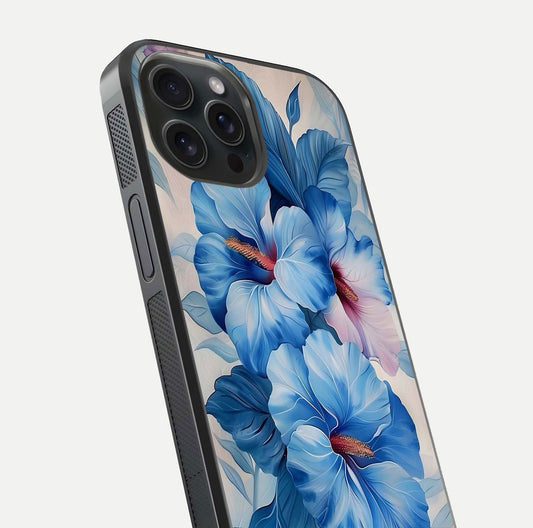 Ocean Hibiscus Grace Glass Case for iPhone 15 Pro close-up angled shot highlighting floral glow and HD shine