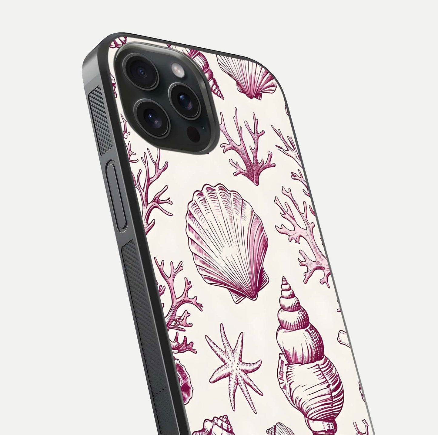 Pink Shells Outline Glass Case for iPhone 15 Pro close-up angled shot showing fine shell lines and reflection